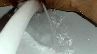 gretala rubs soapy bar over her smooth trimmed pussy closeup