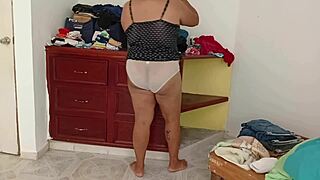 gordita bends over folding clothes accidentally flashing her curvy ass
