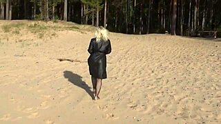 Mature blonde milf struts in fishnet bodystocking showing off big tits and ass