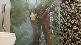 Ebony milf showers with toy caught by black daddy doggystyle pounding