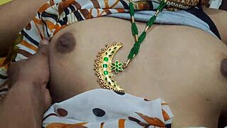 Indian Aunty in Saari Shows Off Big Boobs and Ass in Bedroom Tease