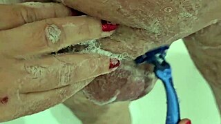shaving his dick n balls smooth for her pov handjob play