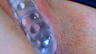 teen puffy shaved pussy grinds sensual glass dildo deep