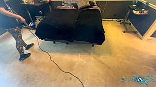 Brunette milf housewife vacuums bedroom in tight skirt showing natural tits