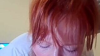 This cute redhead gulps down whole cock deep into her throat