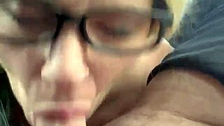 Pretty glasses hooker sucks cum deep in public car blowjob