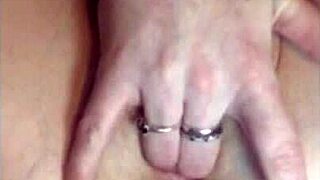 Little redhead in stockings fingers her shaved wet pussy flexibly until she cums on webcam