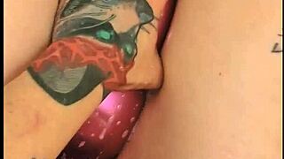 TATTOOED BABE POPS BALLOONS IN LATEX BATH FETISH FUN! 😈🛁