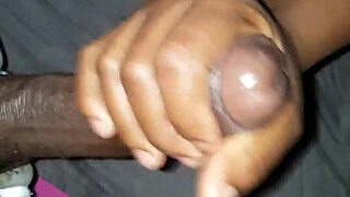 Close-up ebony teen handjobs black monster cock to moaning cumshot