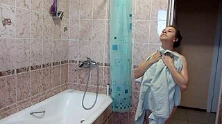 a big titted girl with shaved pussy showers in bathroom homemade fetish