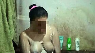 Indonesian housewife strips naked shower, big tits pussy tease reveal