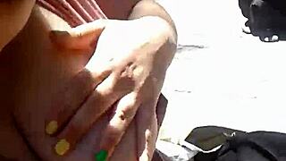 Girlfriend rubs huge tits publicly