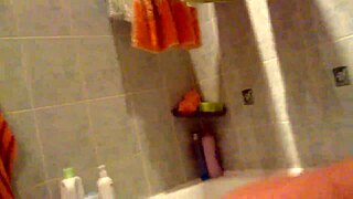 tranny strokes her ass at home