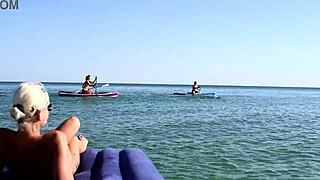 Blonde big tits nudist bitch flashes boobs pussy on public beach!