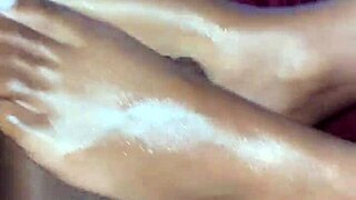 pretty ebony wife strokes black cock to cumshot with her sexy toes and feet