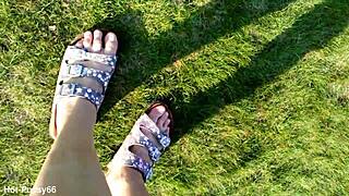 check out these sexy feet in flip flops outdoors