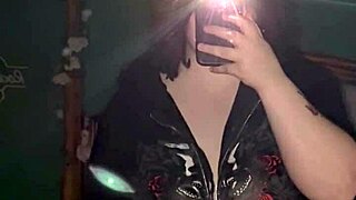 chubby goth girl teases her curves and fat pussy in alternative homemade striptease video