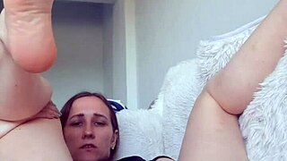 cute latina babe moans stuffing double dildo in both wet holes