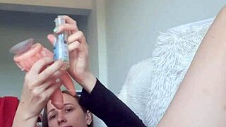 cute latina babe moans stuffing double dildo in both wet holes