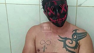 masked stud showers and toys his cock till explosive cumshot