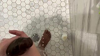 Stepsister slips into shower with stepbrother for steamy close-up handjob and cumshot