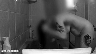 My heart races watching her big natural tits bounce in the shower while she secretly masturbates with dildo.