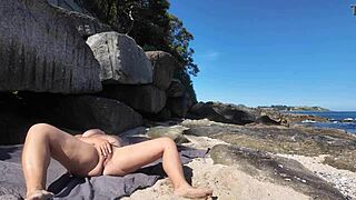 Curvy Nudist Flaunts Hairy Pussy On Beach