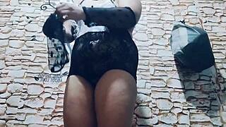 Chubby Asian rubs dildo on pussy and feet in lingerie.