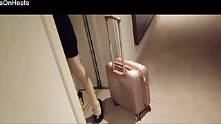 hey check out this sexy milf in stockings and heels strutting hotel corridors