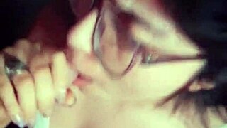 this slut with glasses gives killer blowjobs to her brunette friend