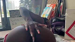 ebony babe's tight pussy lips stretched by relentless fuck machine