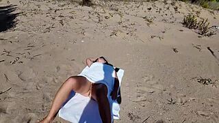 A curious stranger encounters a nudist beach milf flashing her hairy pussy and big natural tits in public outdoor voyeur action