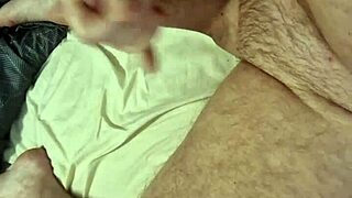 Watch this sexy muscular bodybuilder daddy jerk his big cock close-up moaning
