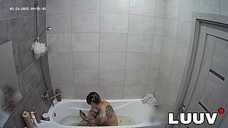 Luuv Tattooed Emily's Private Amateur Show Flashes Tits in Bathroom