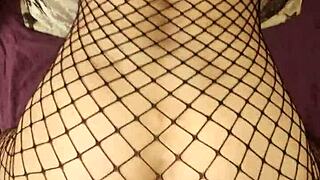 Wife slips into erotic fishnet lingerie for homemade milf porn shoot