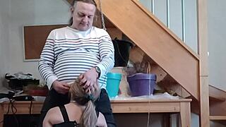 Chained female slave submits in bondage