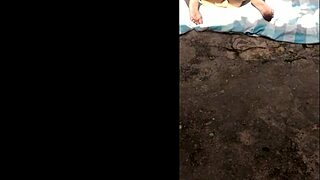 Elvie slut rubs pussy wildly outdoors on phone