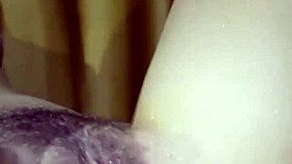 This adorable big ass redhead poses nude then rides to creampie in villa