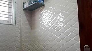 desi bhabi bends over in bathroom for old man's hard doggystyle creampie