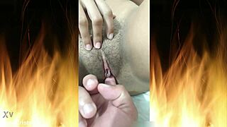 check out this beautiful curly brunette housewife flashing her juicy shaved pussy in blue lingerie close up