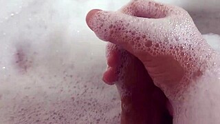 Relaxing in steamy bubble bath as I stroke my wet pussy to solo bliss
