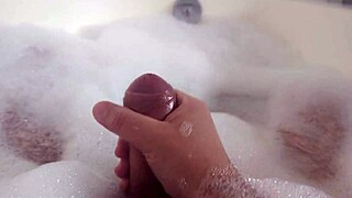 Relaxing in steamy bubble bath as I stroke my wet pussy to solo bliss