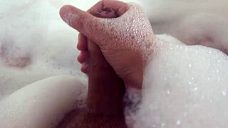 Relaxing in steamy bubble bath as I stroke my wet pussy to solo bliss