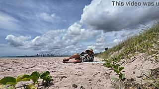 Milf sneaks hairy pussy flashes on crowded beach for voyeur thrills