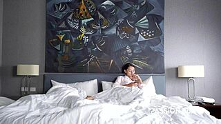 pornstar beauty passionbunny fingers herself quietly next to sleeping boyfriend on early morning webcam