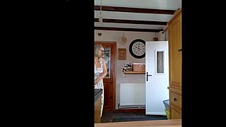 so this busty housewife spots the delivery boy and starts teasing her big boobs right there in the kitchen