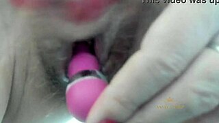 sexy milf strokes hairy pussy closeup moaning till she squirts on hubby's face