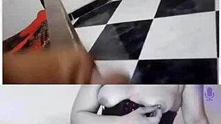 Latina milf in corset heels teases big shaved pussy with dildo on webcam