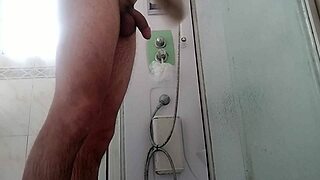 guy showers showing off his huge throbbing monster cock