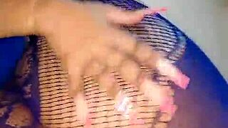 Big ass ebony spreads cheeks for deep anal fingering gape.